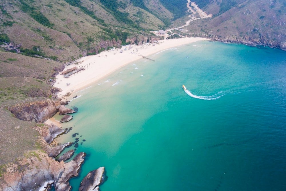 Known for turquoise waters and powdery white sand, Ky Co Beach is a true tropical haven